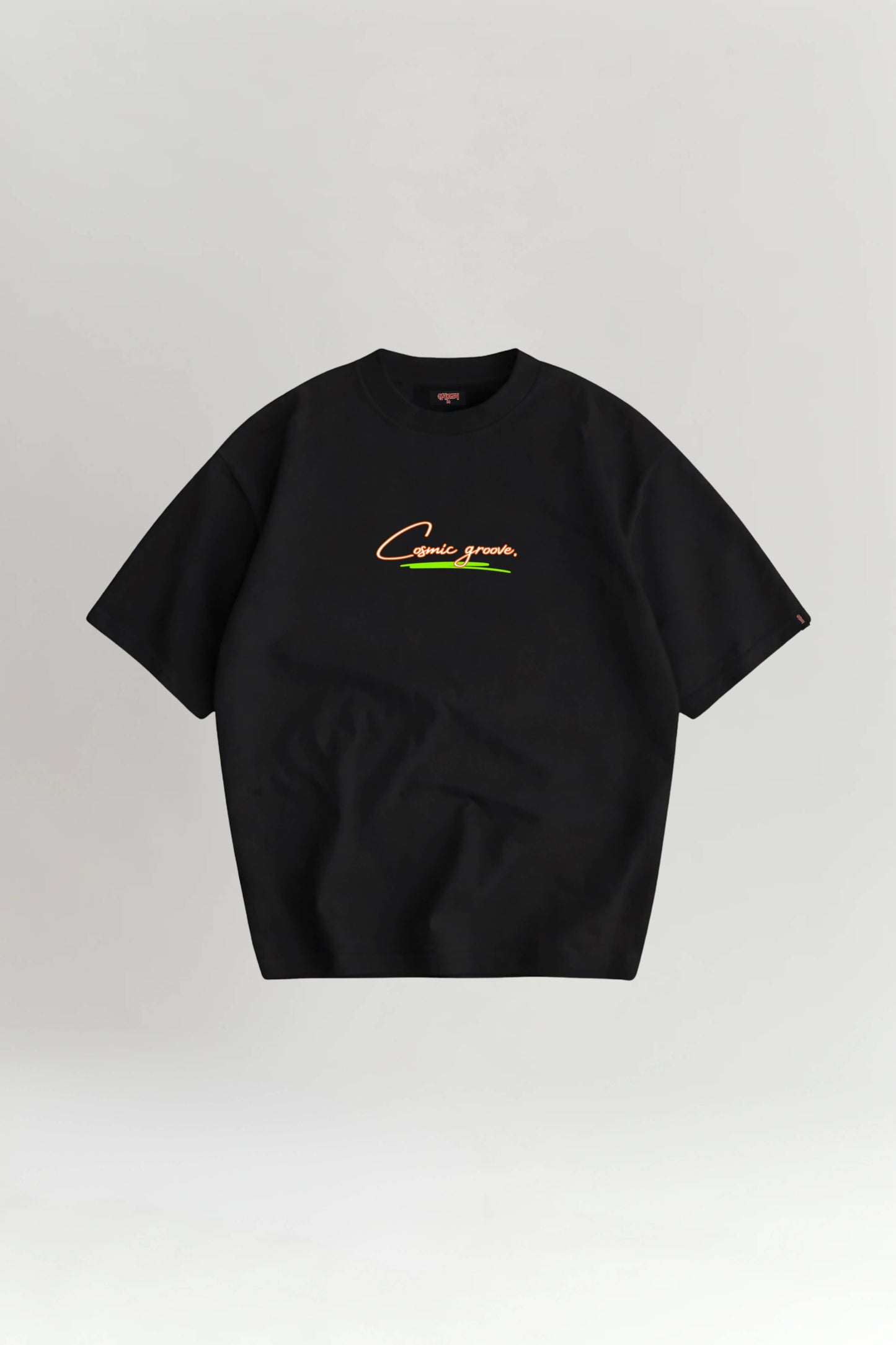 Black t-shirt with text and graphics on a light gray background
