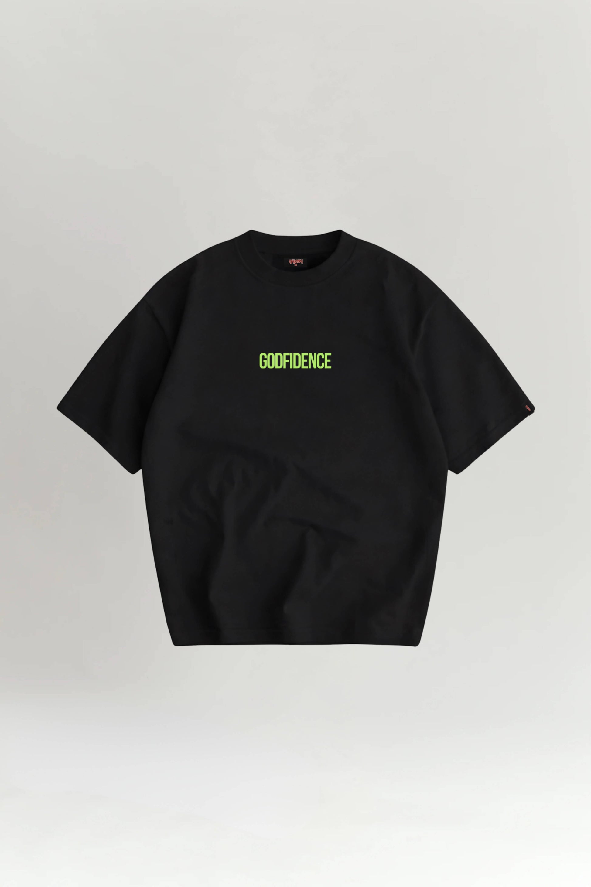 Black t-shirt with 'GODFIDENCE' text on a light gray background