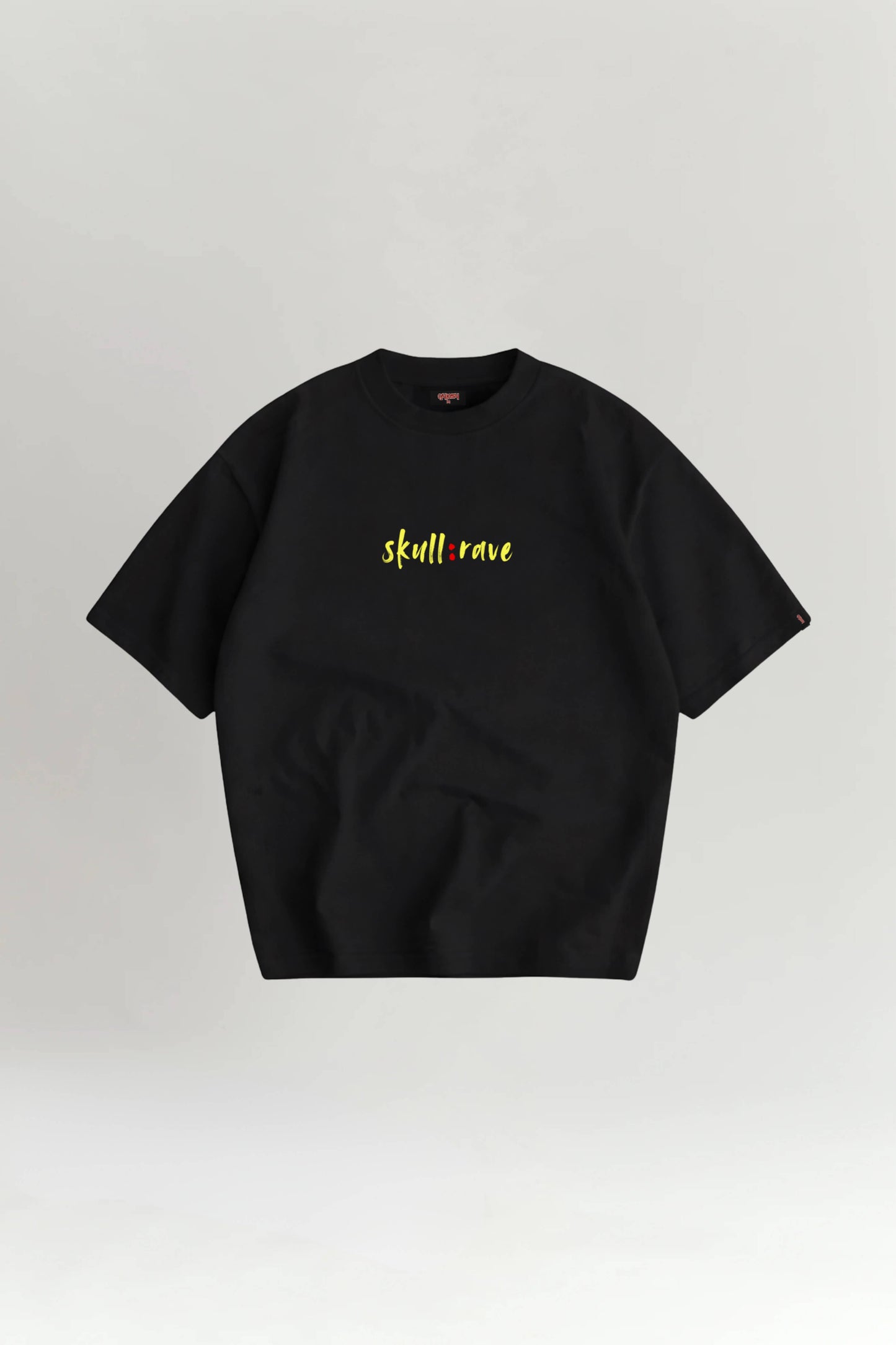 Black t-shirt with yellow text on a light gray background