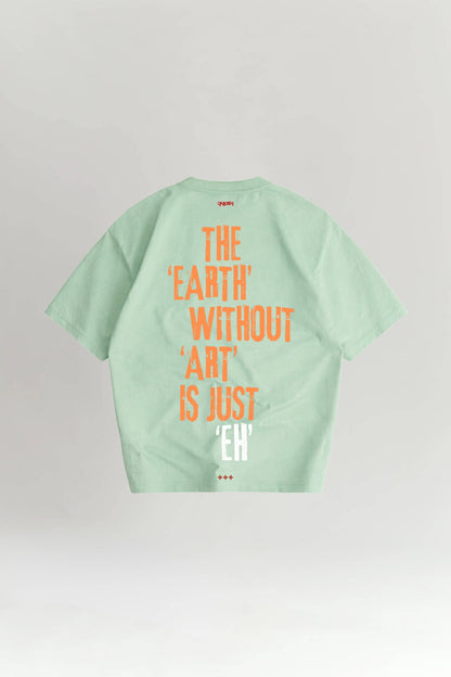 Light green t-shirt with orange text on a gray background