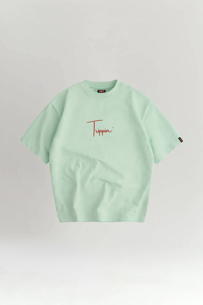 Light green t-shirt with brand logo on a white background