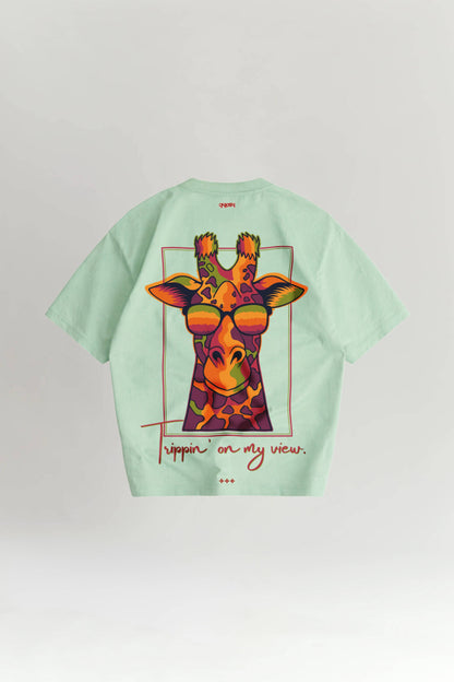 Light green t-shirt with a colorful giraffe graphic and text on a white background