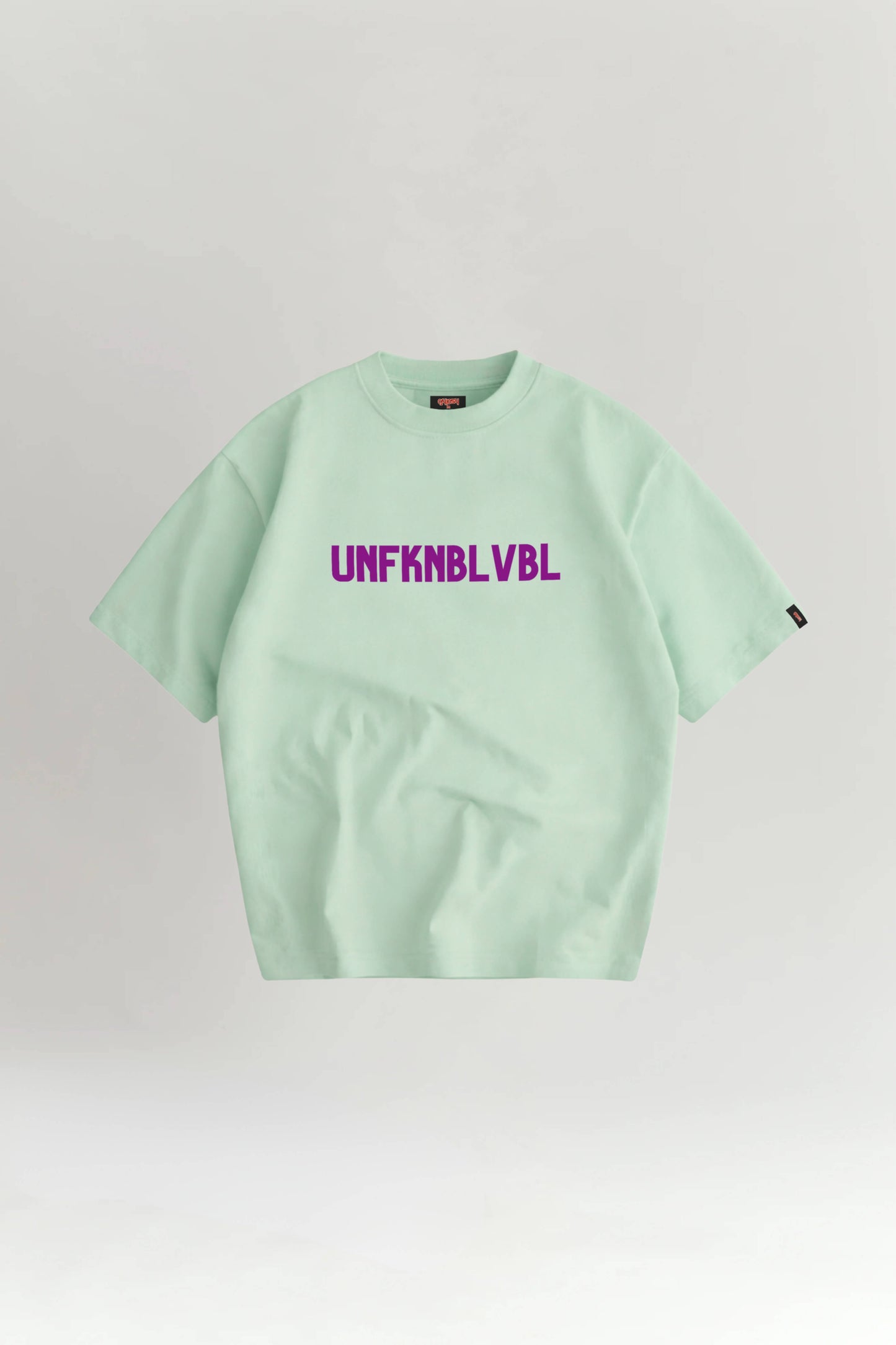 Light green t-shirt with purple text on a white background