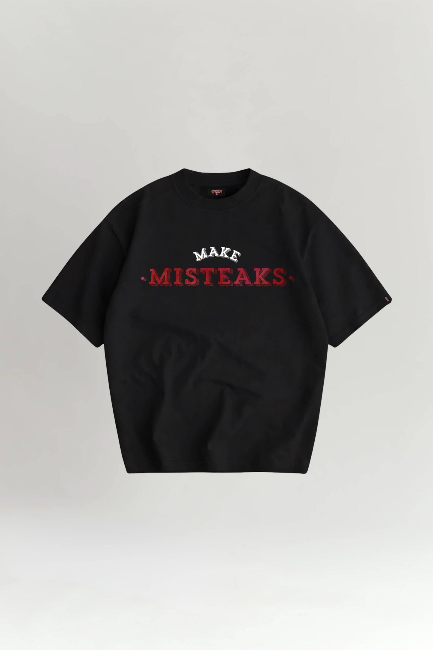 Black t-shirt with red and white text on a light gray background