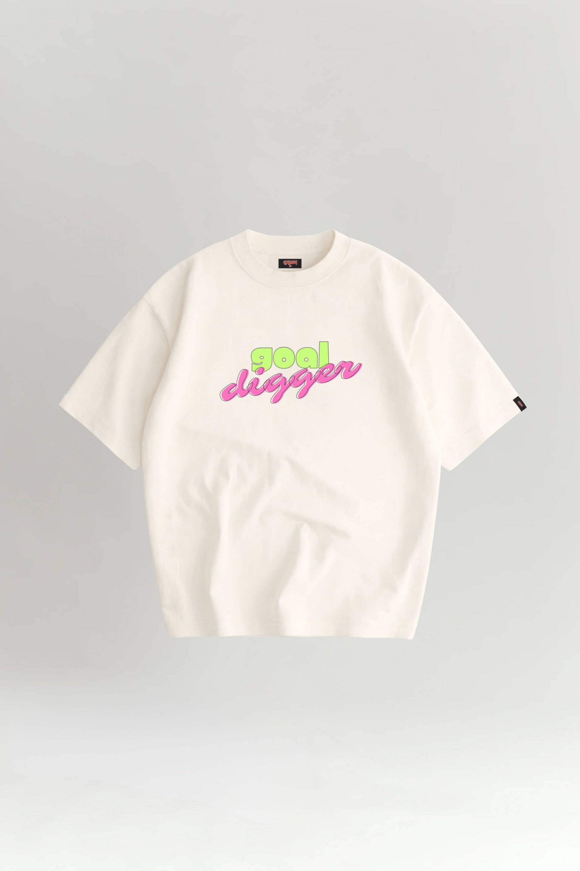 Off white t-shirt with colorful text on a gray background
