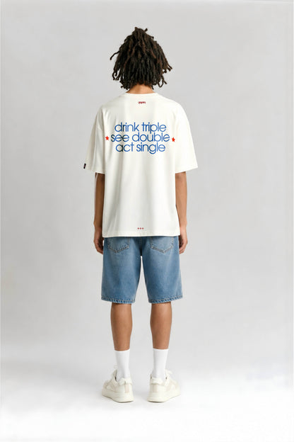 Person wearing a white t-shirt with text on the back, standing against a plain background
