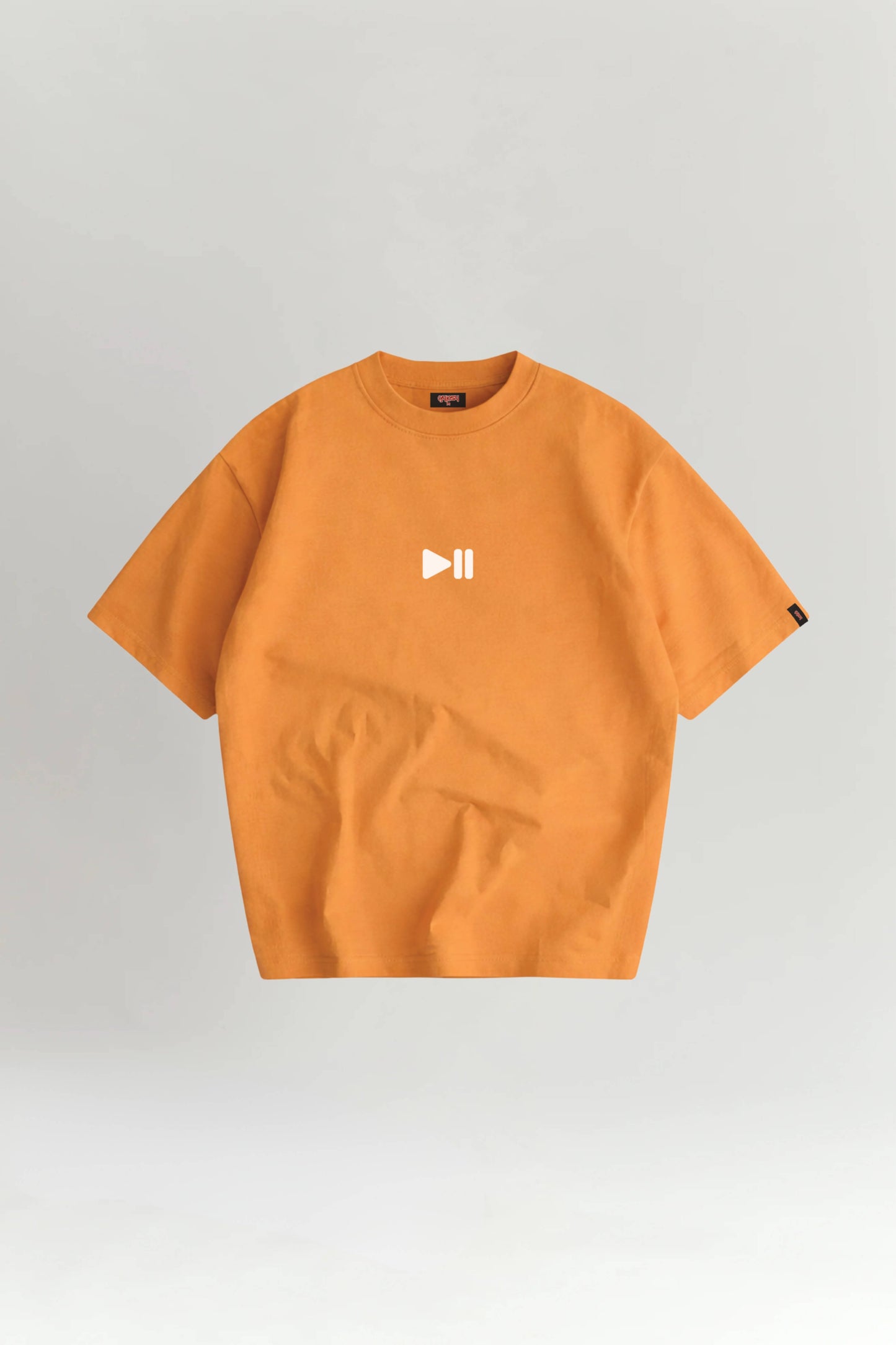 Orange t-shirt with a logo on a gray background