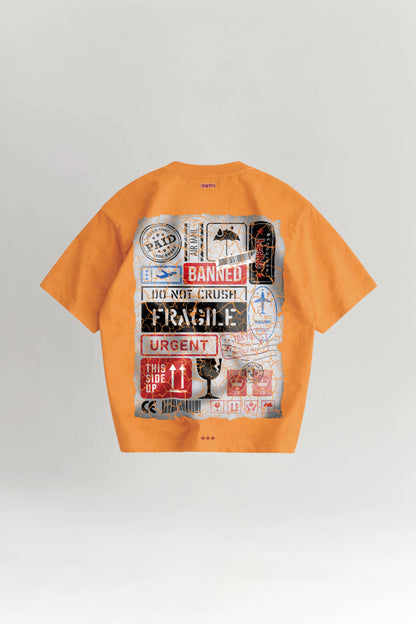 Orange t-shirt with graphic design on a light gray background
