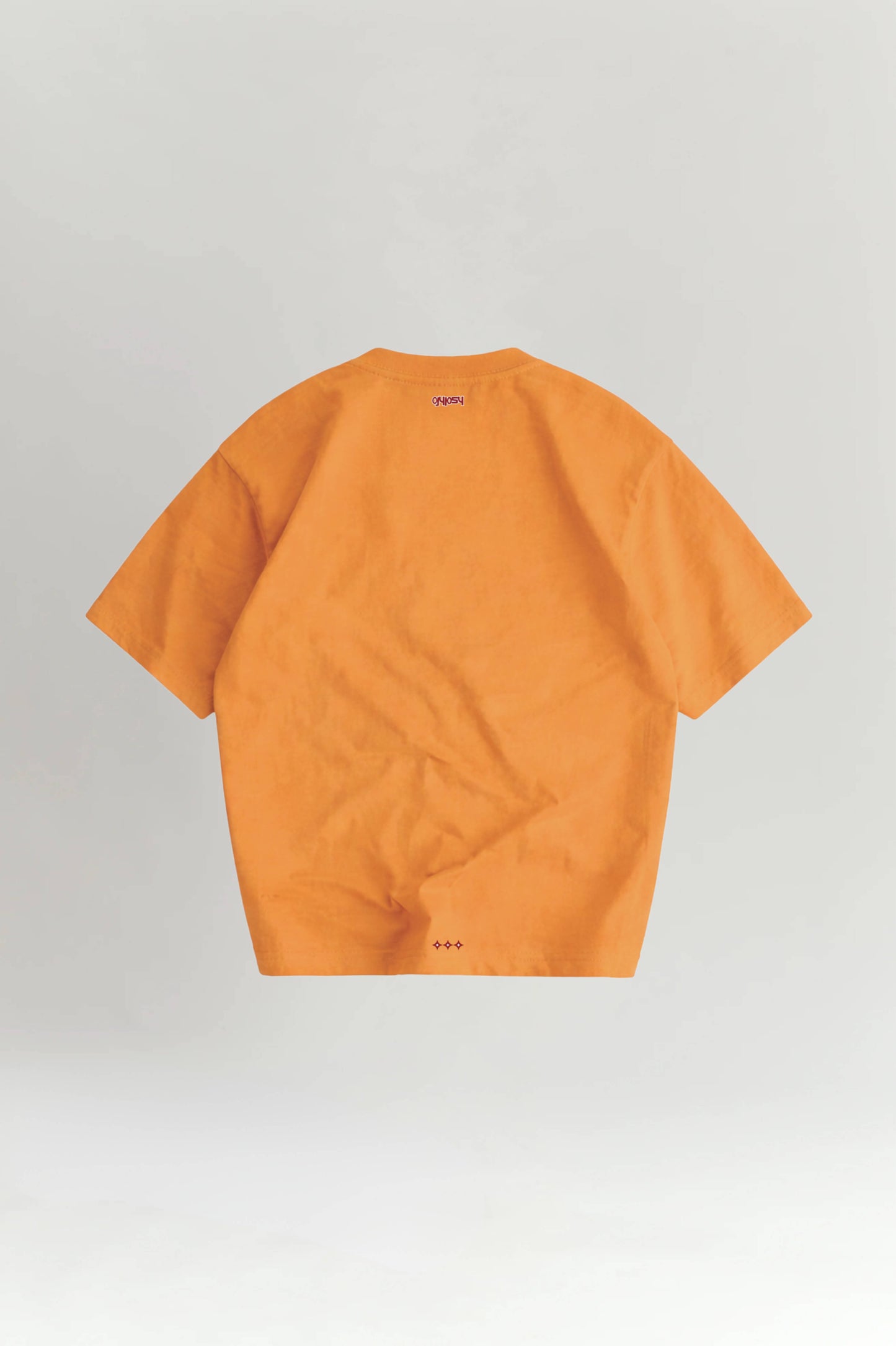 Orange t-shirt on a light gray background