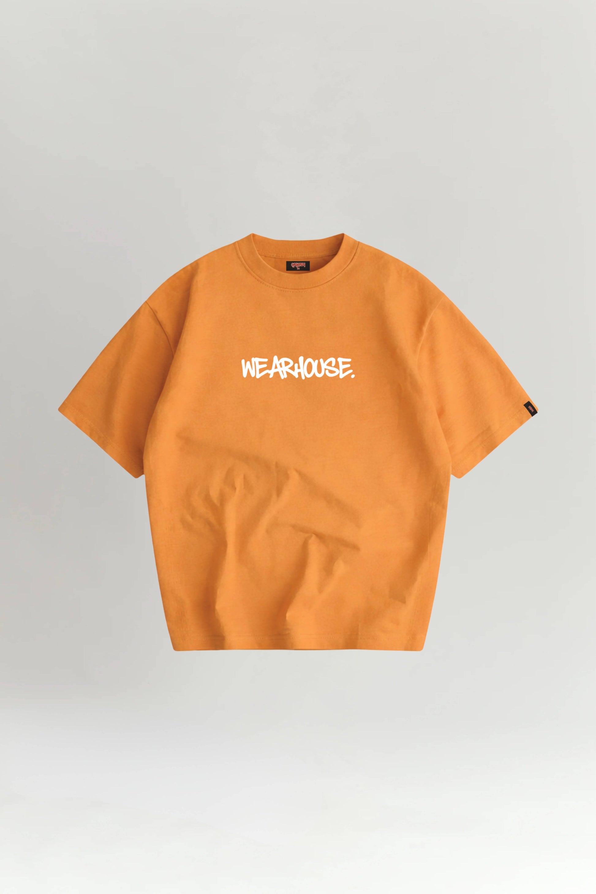 Orange t-shirt with a logo on a gray background