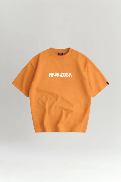 Orange t-shirt with a logo on a gray background